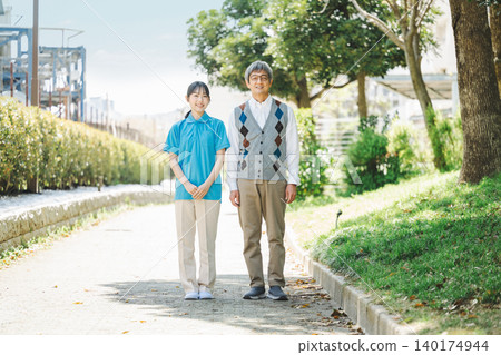 Portrait of a caregiver and a senior man Portrait of a caregiver and a senior man 140174944