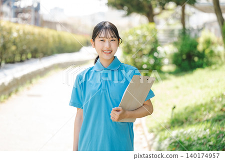 Outdoor portrait of a young care worker Outdoor portrait of a young care worker 140174957