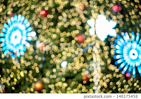 Abstract Christmas light bokeh background with glowing festive snowflake decorations and sparkling golden fairy lights, creating magical holiday atmosphere, seasonal celebration backdrop and elegant 140175458