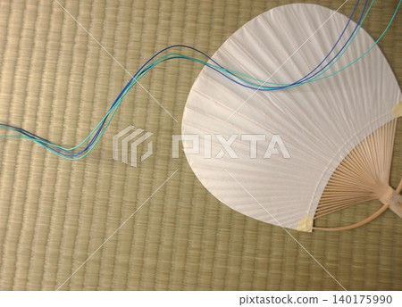 A fan placed on a tatami mat A fan placed on a tatami mat 140175990