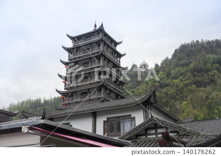 Pagoda near the railway station in Zhangjiajie, China in foggy weather Pagoda near the railway station in Zhangjiajie, China in foggy weather 140176262