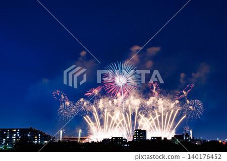 Fireworks shining in the night sky Fireworks shining in the night sky 140176452