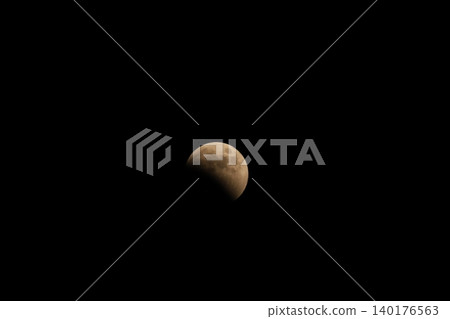The moon heading towards a total lunar eclipse (photographed in 2022) The moon heading towards a total lunar eclipse (photographed in 2022) 140176563