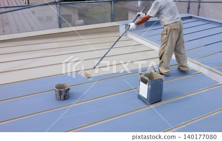 A scene of a craftsman working on a roof. 140177080