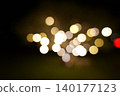 Abstract Red yellow Bokeh Lights Background in Urban Night Scene 140177123