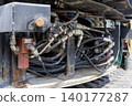 Backhoe hydraulic control valves and piping 140177287