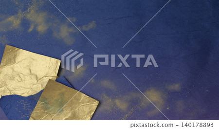 A traditional Japanese material featuring a soft shimmer of gold mist patterns and gold powder on indigo-colored washi paper. A traditional Japanese material featuring a soft shimmer of gold mist patterns and gold powder on indigo-colored washi paper. 140178893