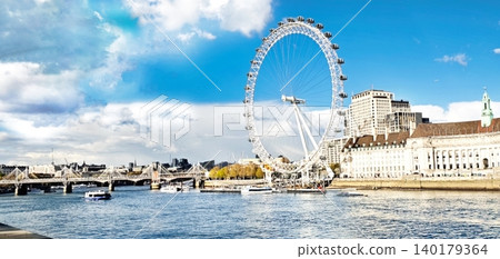 Europe's largest Ferris wheel, the London Eye, faces the sky on the south bank of the Thames. England Europe's largest Ferris wheel, the London Eye, faces the sky on the south bank of the Thames. England 140179364