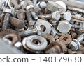 A large collection of old bolts and nuts 140179630