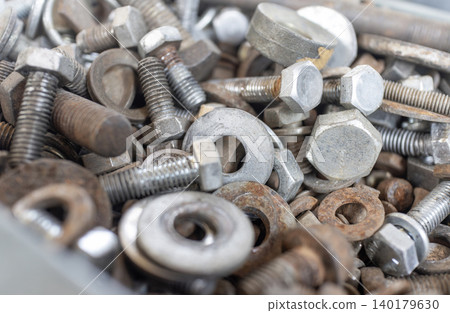 A large collection of old bolts and nuts A large collection of old bolts and nuts 140179630