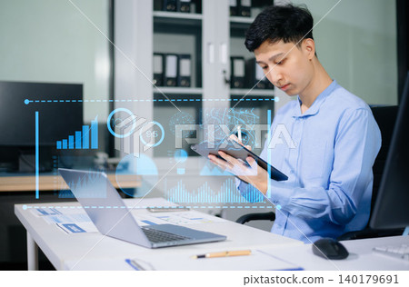Asian business analyst reviewing digital dashboard, financial charts and business data in modern office, showcasing analytics, fintech, AI and strategic planning. Asian business analyst reviewing digital dashboard, financial charts and business data in modern office, showcasing analytics, fintech, AI and strategic planning. 140179691