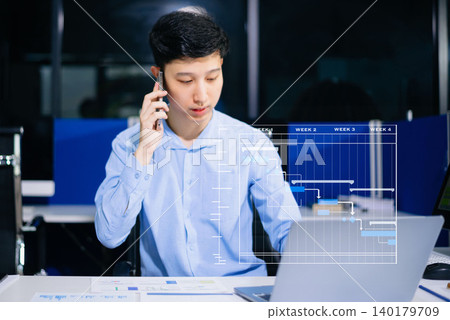 Project manager working and update tasks with milestones progress planning and Gantt chart scheduling diagram.business tram working at office Project manager working and update tasks with milestones progress planning and Gantt chart scheduling diagram.business tram working at office 140179709