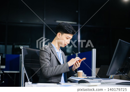 business man executive manager looking at laptop watching online webinar training or having virtual meeting video conference business man executive manager looking at laptop watching online webinar training or having virtual meeting video conference 140179725