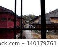 The red lattice townhouses of Kanazawa's Higashi Chaya District, as seen from the window. 140179761