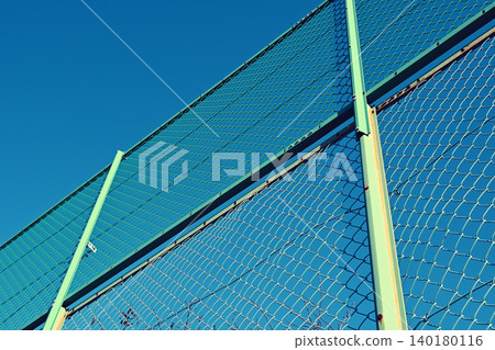 Blue sky and fence Blue sky and fence 140180116