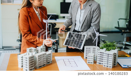 Real estate broker agent presenting and consult to customer to decision making sign insurance form agreement, home model Real estate broker agent presenting and consult to customer to decision making sign insurance form agreement, home model 140180283