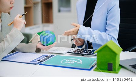 Business team working virtual modern smartphone to reduce CO2 emissions carbon footprint climate change to limit global warming Business team working virtual modern smartphone to reduce CO2 emissions carbon footprint climate change to limit global warming 140180441
