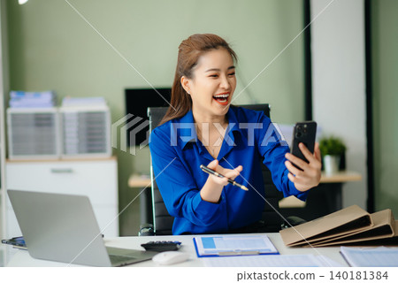 Woman freelancer is working her job on computer tablet and laptop Doing accounting analysis report real estate investment Woman freelancer is working her job on computer tablet and laptop Doing accounting analysis report real estate investment 140181384