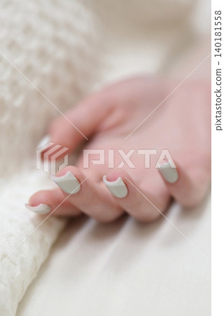 SPA salon and massage. Massage room. A massage therapist is working with a young woman. Hand massage. SPA salon and massage. Massage room. A massage therapist is working with a young woman. Hand massage. 140181558