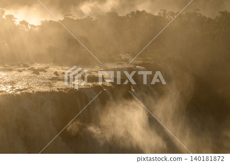Feel profound awe watching dramatic iguazu falls flow with heavy mist Feel profound awe watching dramatic iguazu falls flow with heavy mist 140181872