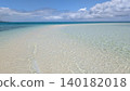 The white sandy beaches and blue sea of a mythical island 140182018