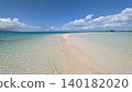 The white sandy beaches and blue sea of a mythical island 140182020