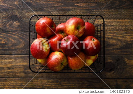 Apple. Ripe juicy red apple fruits with natural vitamins and antioxidants, healthy food, top view 140182370