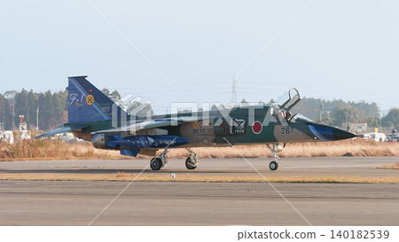 A Japan Air Self-Defense Force F-1 fighter jet with special commemorative paint scheme for its final year, taxiing. A Japan Air Self-Defense Force F-1 fighter jet with special commemorative paint scheme for its final year, taxiing. 140182539