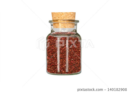 sumac in glass container isolated on white background 140182908