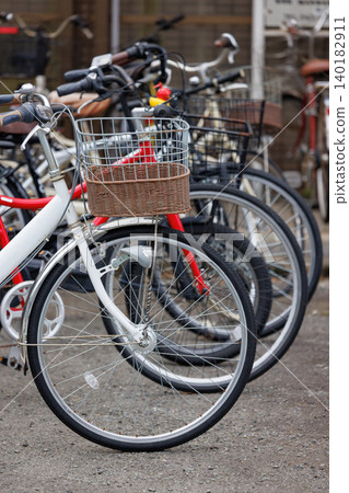 Bicycles parked in a bicycle parking lot Bicycles parked in a bicycle parking lot 140182911