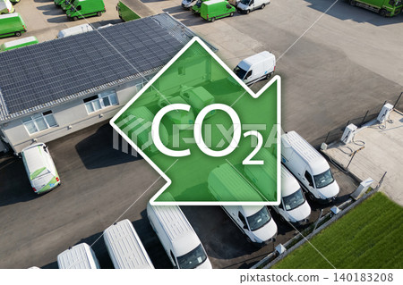 Fleet of vans with CO2 emission reduction symbol. Decarbonization and carbon neutrality concept Fleet of vans with CO2 emission reduction symbol. Decarbonization and carbon neutrality concept 140183208