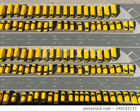 Delivery vans hub. Fleet of yellow post vehicles 140183233