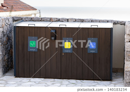 Bins for separate collection of garbage. Bins for separate collection of garbage. 140183234