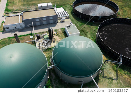 Aerial view of biogas plant with electric power station. Aerial view of biogas plant with electric power station. 140183257