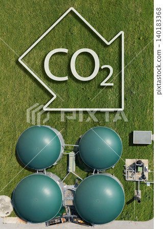 Biogas plant with CO2 emission reduction symbol. Decarbonization and carbon neutrality concept 140183368