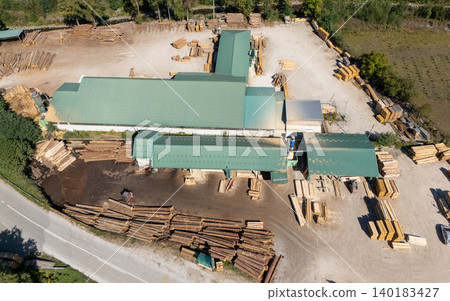 Aerial view of a sawmill factory in the mountains Aerial view of a sawmill factory in the mountains 140183427