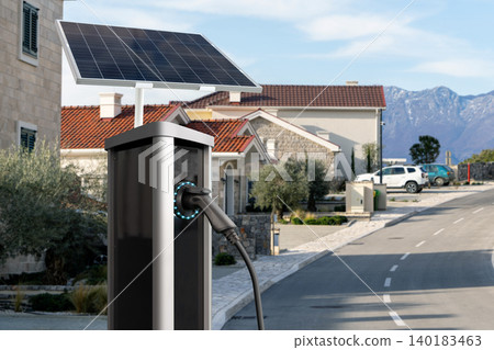 Electric vehicle charging station with built-in solar panel Electric vehicle charging station with built-in solar panel 140183463