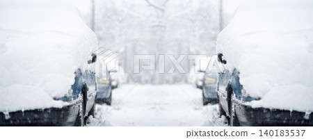 Parked car covered with snow during snow storm Parked car covered with snow during snow storm 140183537