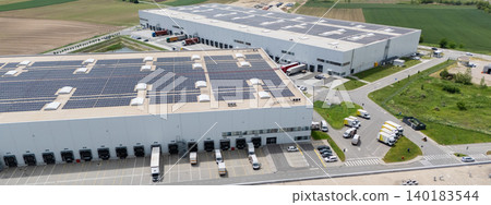 Logistics centers with solar panels on roofs. Aerial view Logistics centers with solar panels on roofs. Aerial view 140183544