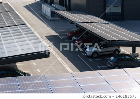 Parking space with solar canopies Parking space with solar canopies 140183573