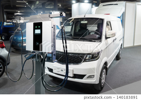 Electric delivery van with electric vehicles charging station. Electric delivery van with electric vehicles charging station. 140183891
