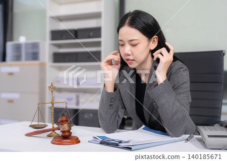 Legal counsel is sitting at table, Stress. client crisis negotiating concept. Legal counsel is sitting at table, Stress. client crisis negotiating concept. 140185671