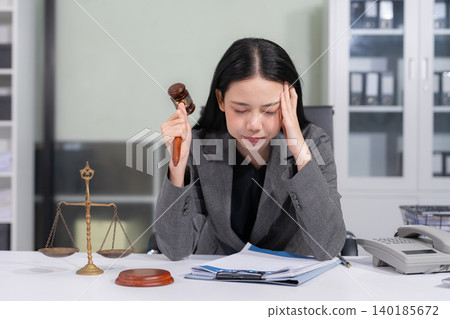 Legal counsel is sitting at table, Stress. client crisis negotiating concept. Legal counsel is sitting at table, Stress. client crisis negotiating concept. 140185672