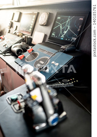 Modern boat dashboard with navigation system, marine radar and VHF Radio in ship captain bridge Modern boat dashboard with navigation system, marine radar and VHF Radio in ship captain bridge 140185761