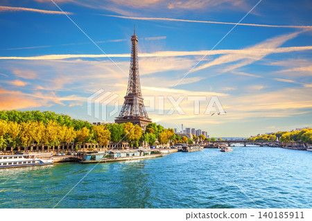 Breathtaking golden sunset aerial view of Eiffel Tower and Seine river bridges in Paris, France Breathtaking golden sunset aerial view of Eiffel Tower and Seine river bridges in Paris, France 140185911