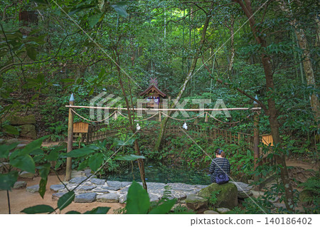 Mirror Pond in the Sakusame Forest, the inner sanctuary of Yaegaki Shrine, Shimane Prefecture 140186402