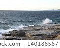 A landscape of rough seas and rocky coastlines 140186567
