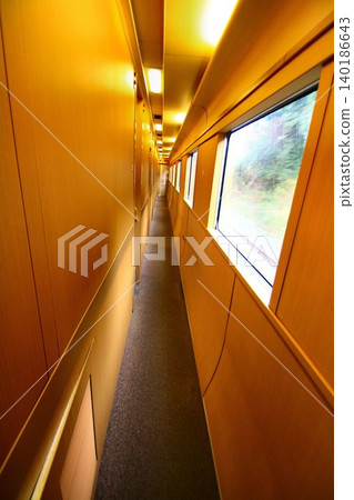 A comfortable overnight train journey... The interior (aisle) of the 285 series "Sunrise Izumo/Seto" sleeper train, specifically the "Salohane 285" type car. A comfortable overnight train journey... The interior (aisle) of the 285 series "Sunrise Izumo/Seto" sleeper train, specifically the "Salohane 285" type car. 140186643