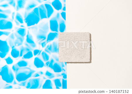 Flat lay composition combining vibrant blue swimming pool water ripple texture background Flat lay composition combining vibrant blue swimming pool water ripple texture background 140187152
