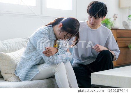 Young men and women who are feeling unwell Young men and women who are feeling unwell 140187644